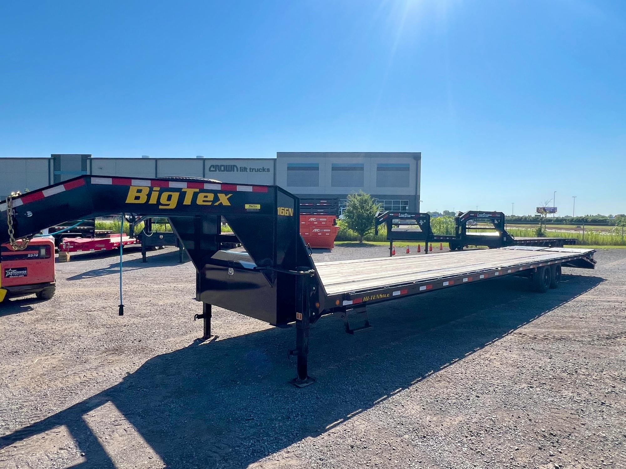 Big Tex USED 40'x102" Gooseneck Flatbed Trailer w/ 5ft Dovetail & Mega Ramps - Image 2
