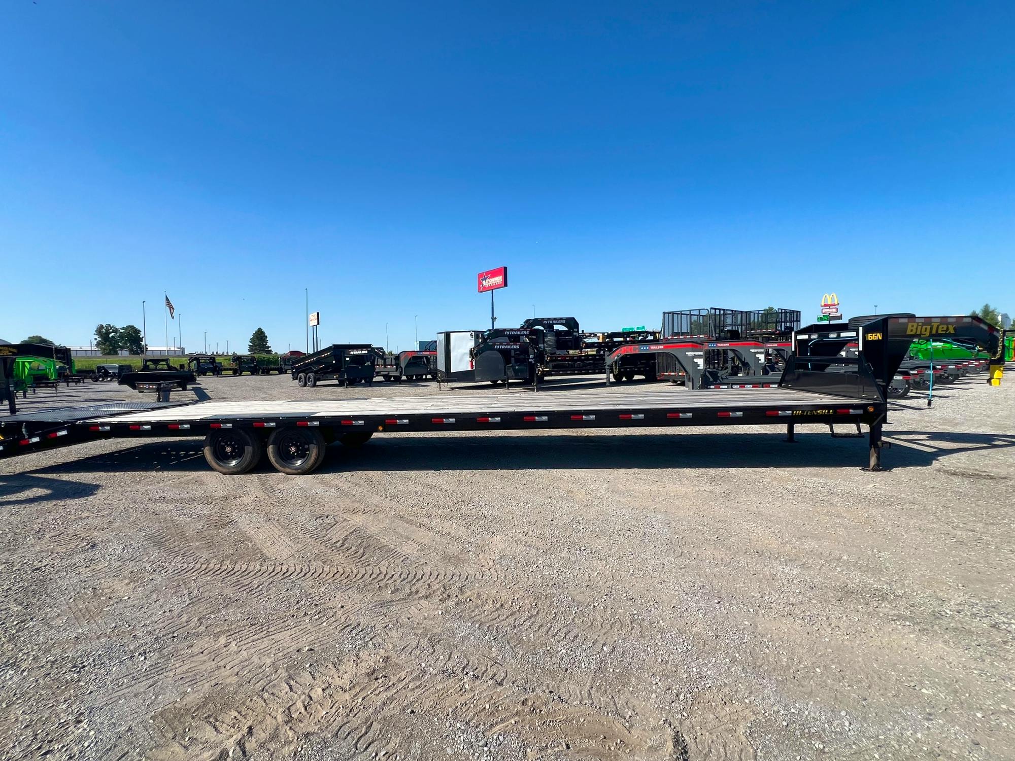 Big Tex USED 40'x102" Gooseneck Flatbed Trailer w/ 5ft Dovetail & Mega Ramps - Image 3