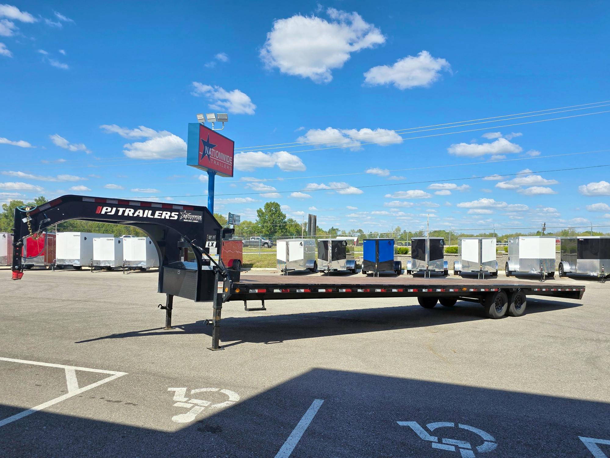 PJ Trailers USED 40'x102" Gooseneck Flatbed Trailer w/ Singles (LX) - Image 1