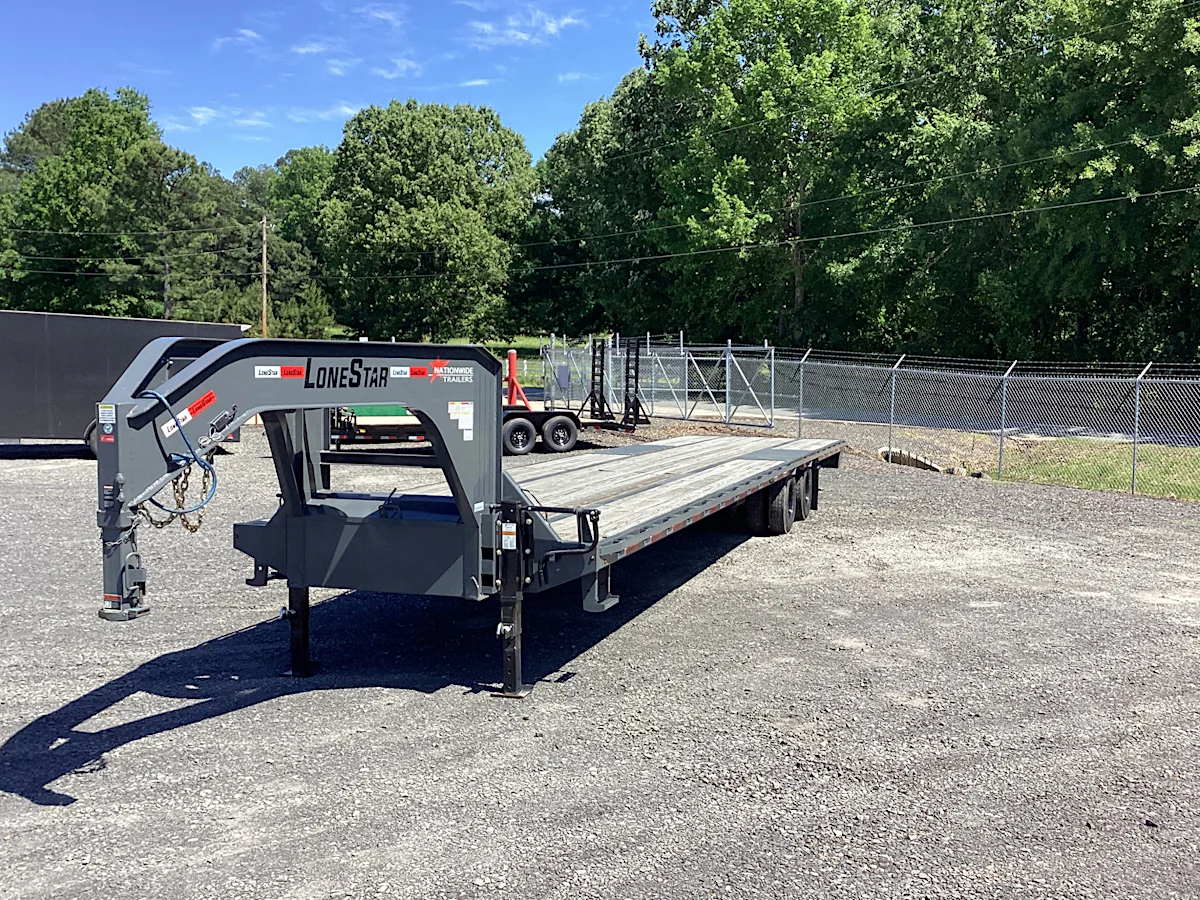 LoneStar USED 40'x102" Flatbed Trailer w/ Duals - Stock #73435 - Image 1 of 4 LoneStar USED 40'x102" Flatbed Trailer w/ Duals - Stock #73435 - Image 1 of 4