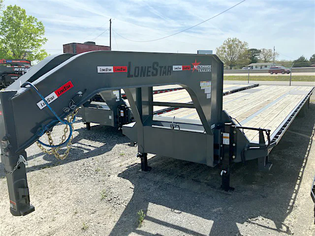 LoneStar 40'x102" Flatbed Trailer w/ Duals - Stock #73435 - Image 1 of 5 LoneStar 40'x102" Flatbed Trailer w/ Duals - Stock #73435 - Image 1 of 5