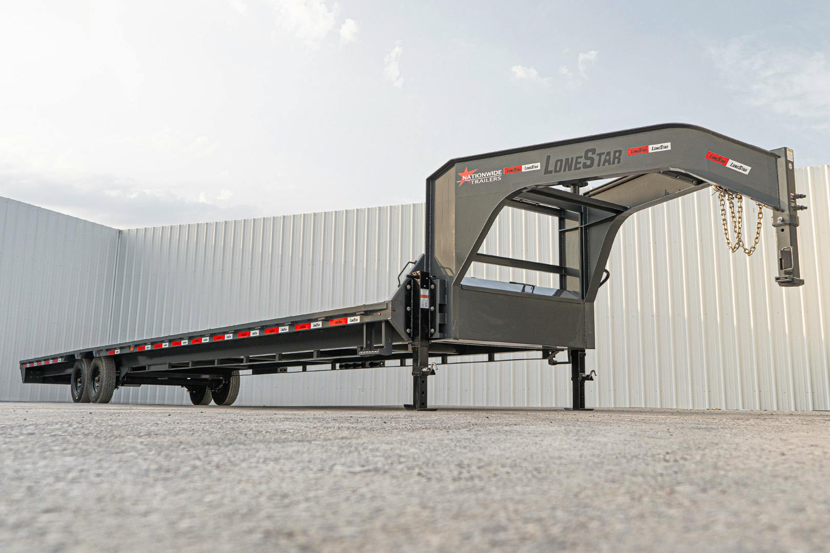 LoneStar 40'x102" Gooseneck Lo-Pro Flatbed Trailer w/ Singles (LS) - Image 1