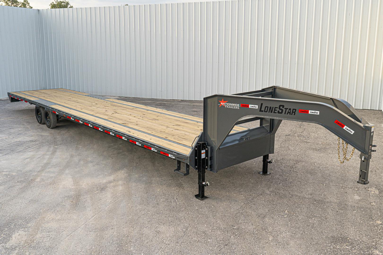 LoneStar 40'x102" Gooseneck Lo-Pro Flatbed Trailer w/ Singles (LS) - Image 1
