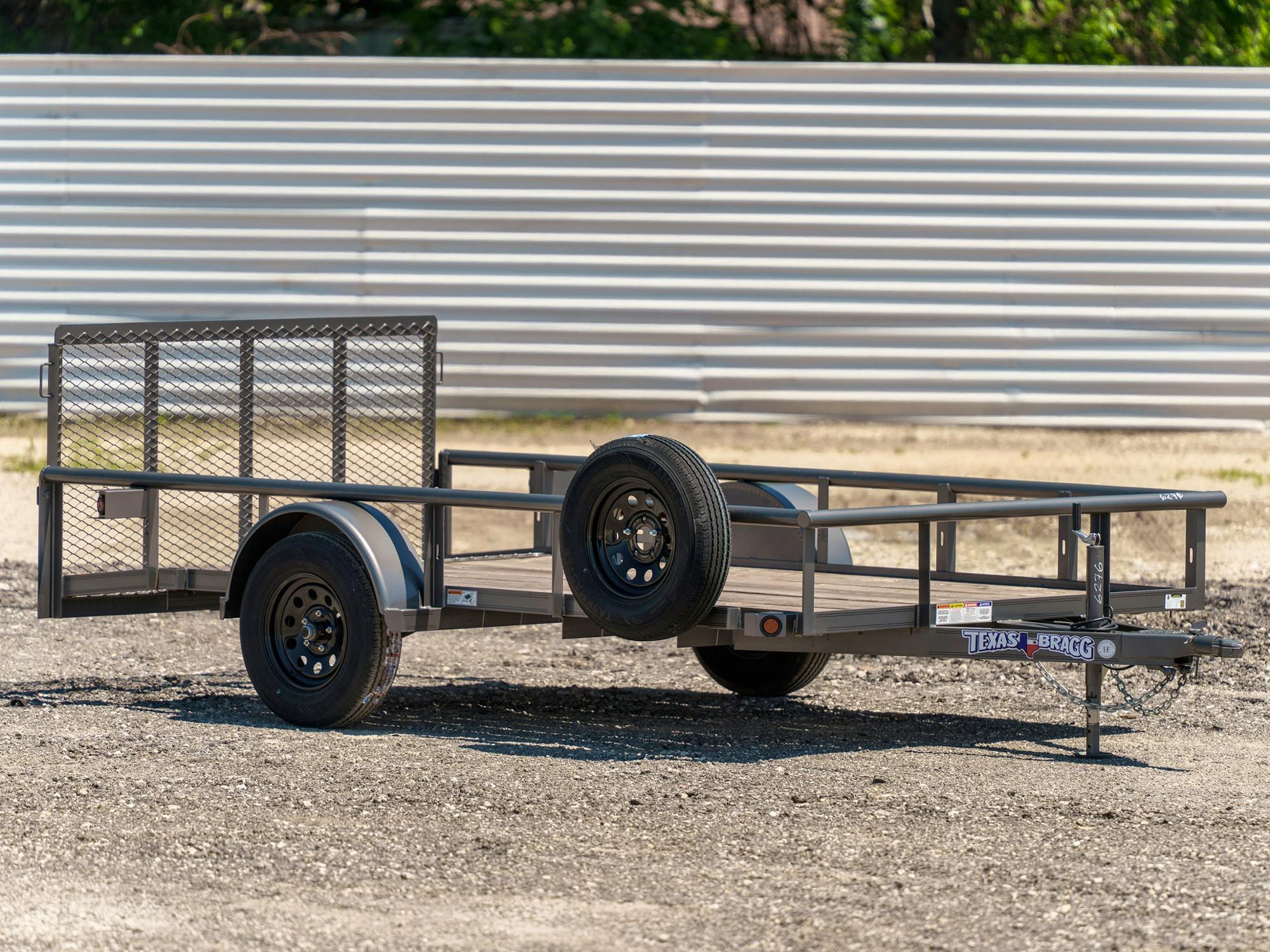 Texas Bragg 12'x77" Utility Trailer w/ 3' Gate & 2' Dovetail (U1) - Stock #83142 - Image 1 of 4