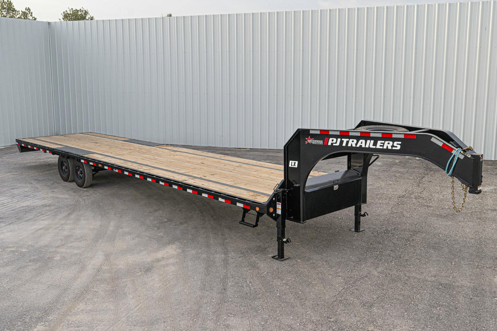 PJ Trailers 25'x102" 18k Gooseneck Flatbed Trailer w/ Singles (LX) - Image 1