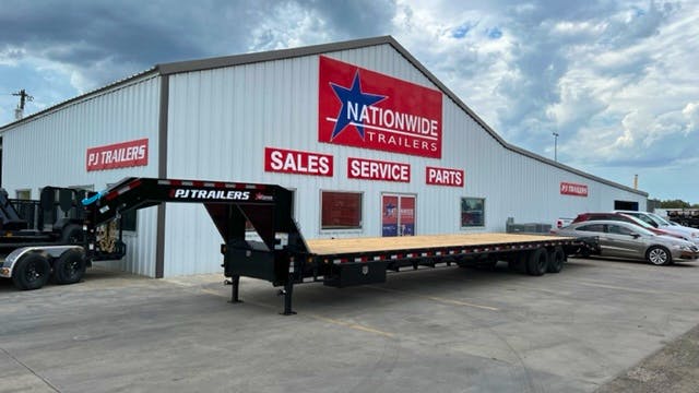 PJ Trailers 40'x102" Flatbed Trailer w/ Duals & Air-ride (FD) - Image 1