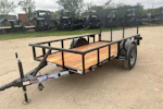 Texas Bragg 10'x60" Utility Trailer w/ 3' Gate (U1) Stock #86415 - Thumbnail 1