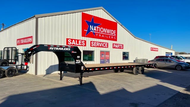 PJ Trailers 32'x102" 18k Gooseneck Flatbed Trailer w/ Singles (LX) - Image 1