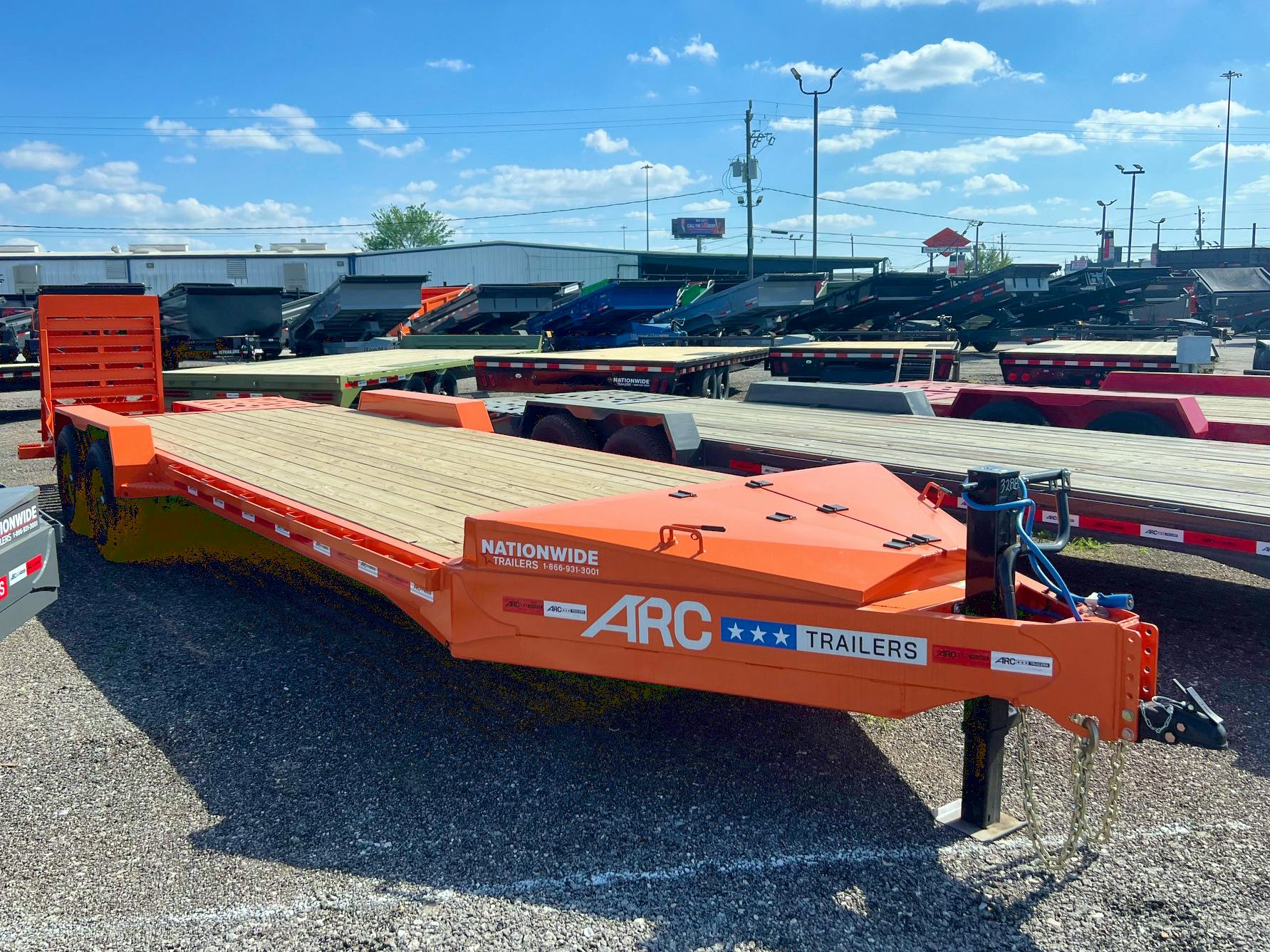 ARC Trailers 24'x83" 14K HD Equipment Hauler w/ 4' Dovetail & Bigfoot Ramps (BEQ) - Stock #87394 - Image 1 of 4