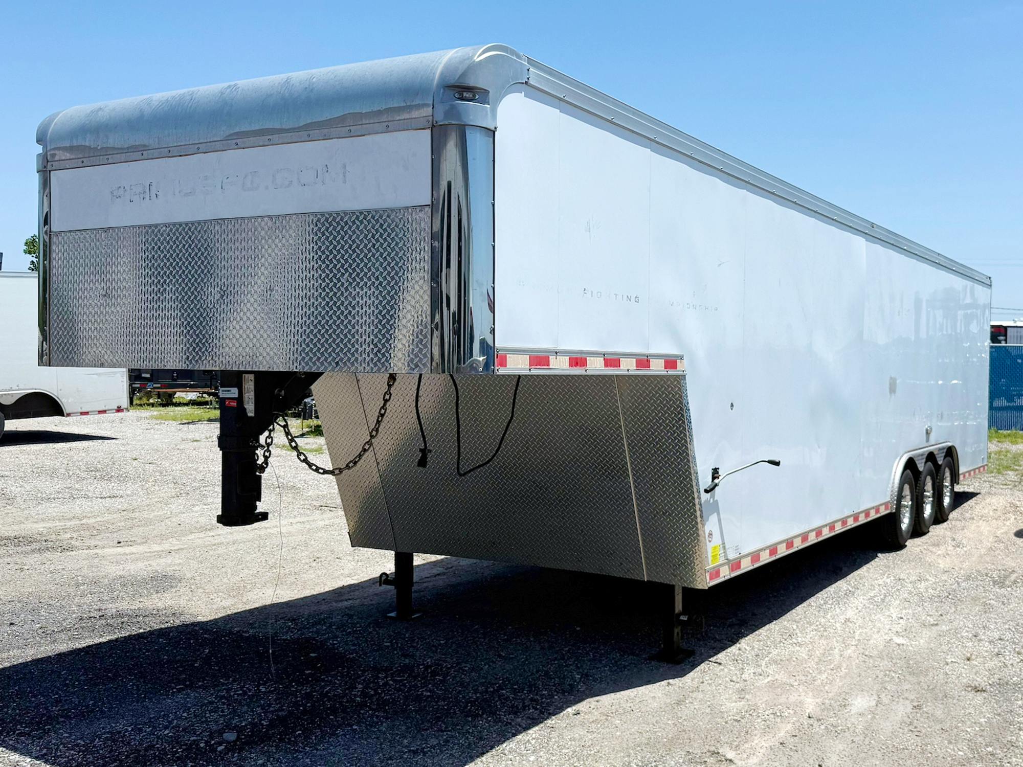 Cargo Mate USED 8.5'x34' Triple Axle Gooseneck Enclosed Cargo Trailer
