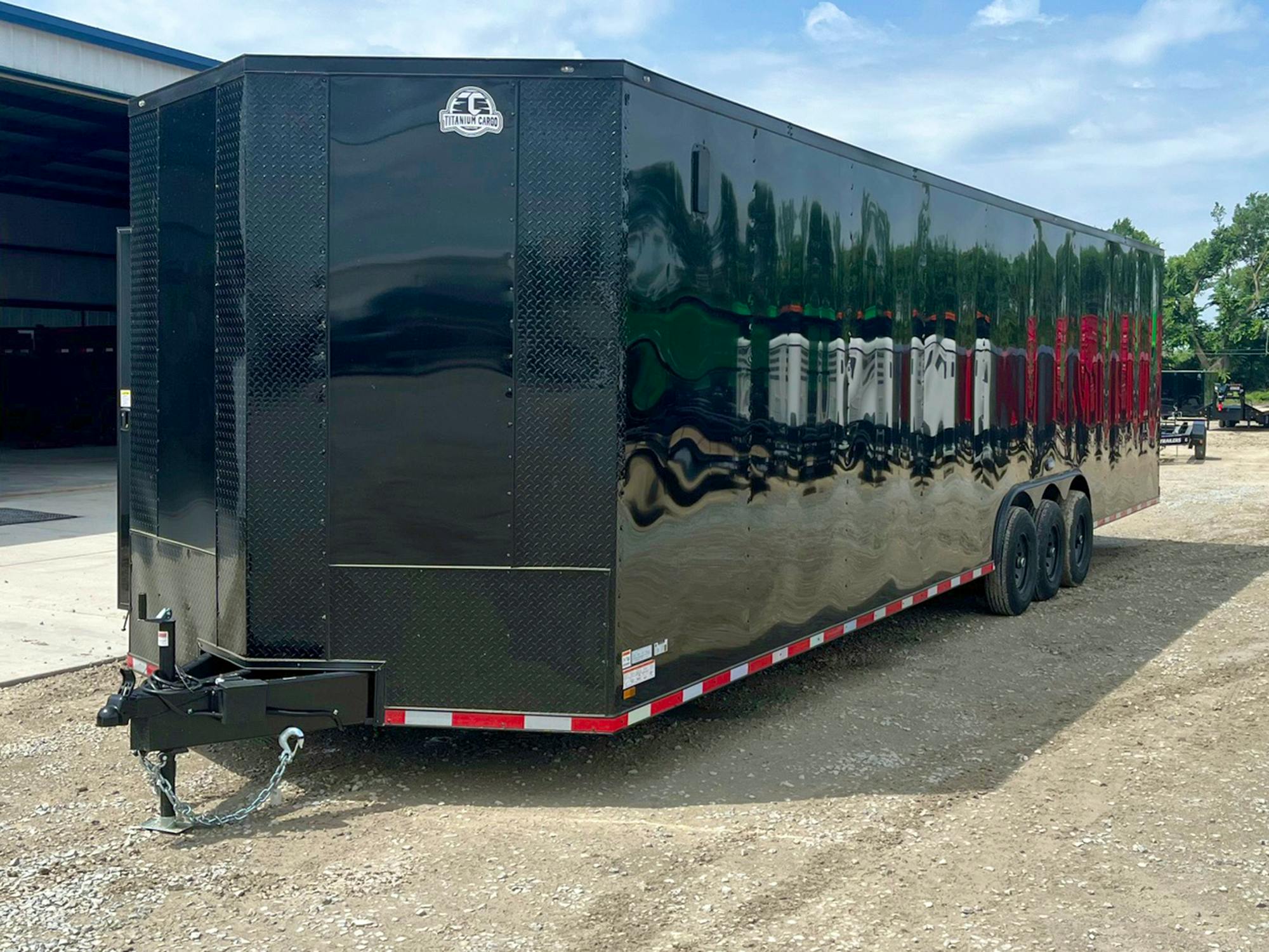 Titanium Cargo USED 8.5'x36' Triple Axle Cargo Trailer w/ Rear Ramp Door - Stock #91458 - Image 1 of 1